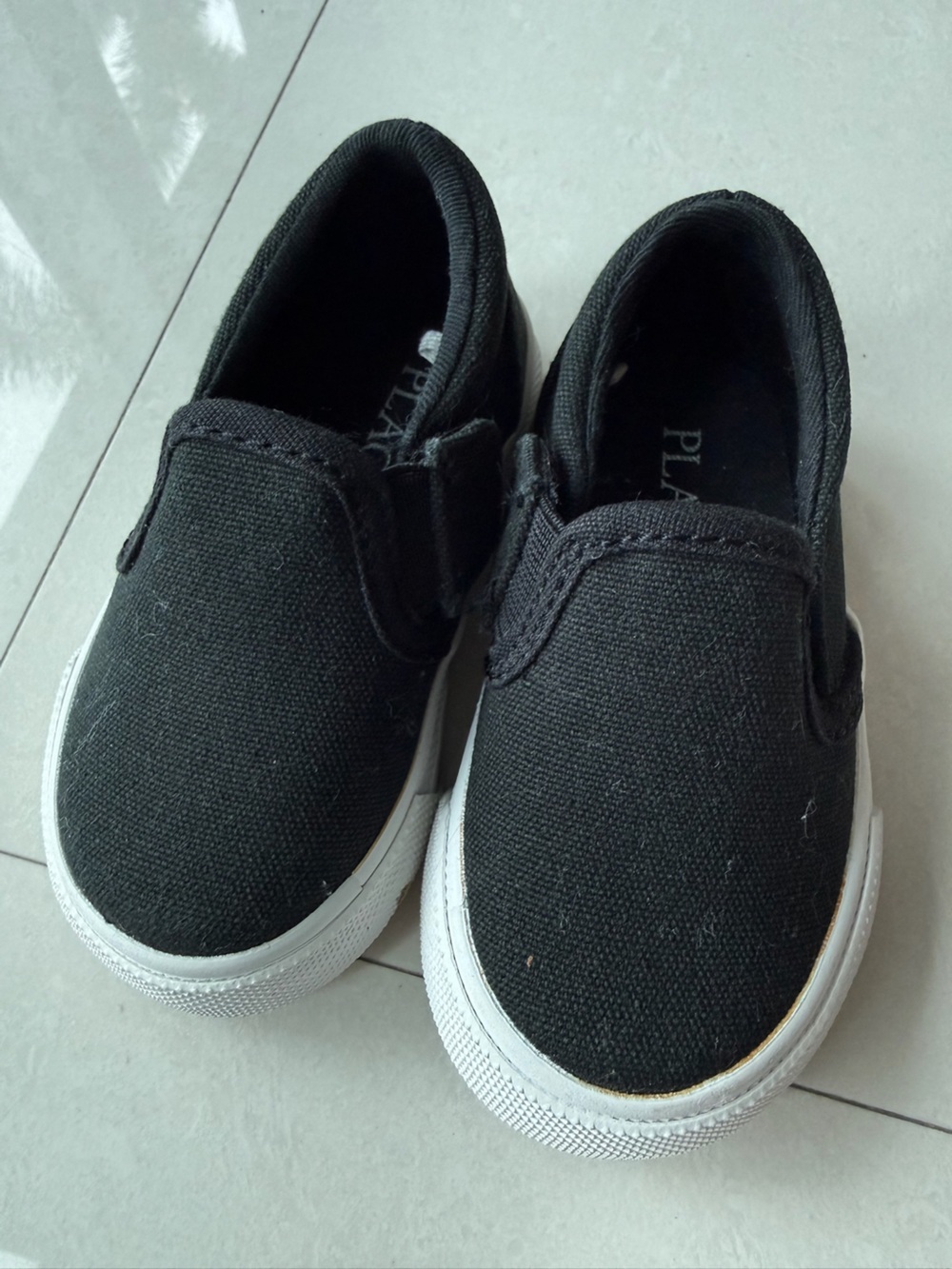 Classic Black Slip-On Sneakers!